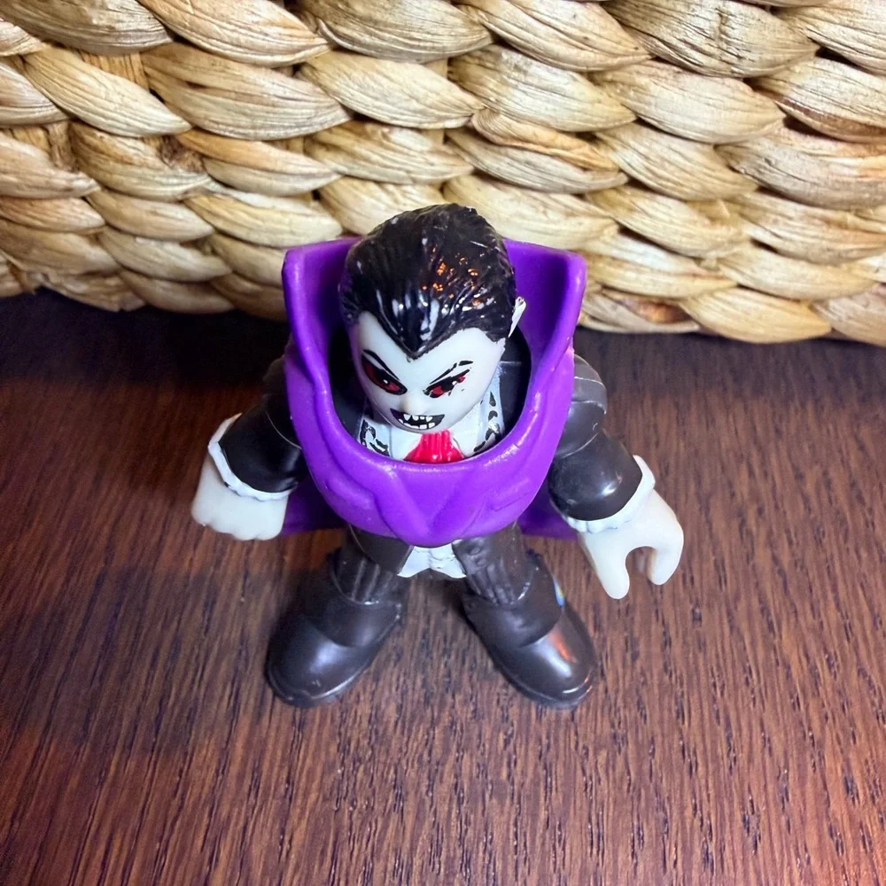 Fisher-Price Purple-Caped Vampire Imaginext Action Figure